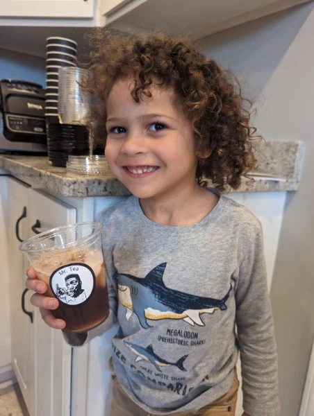 little-guy-drinking-tea